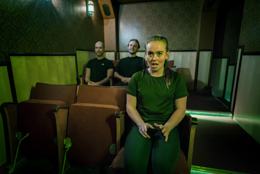 a group in cinema chairs