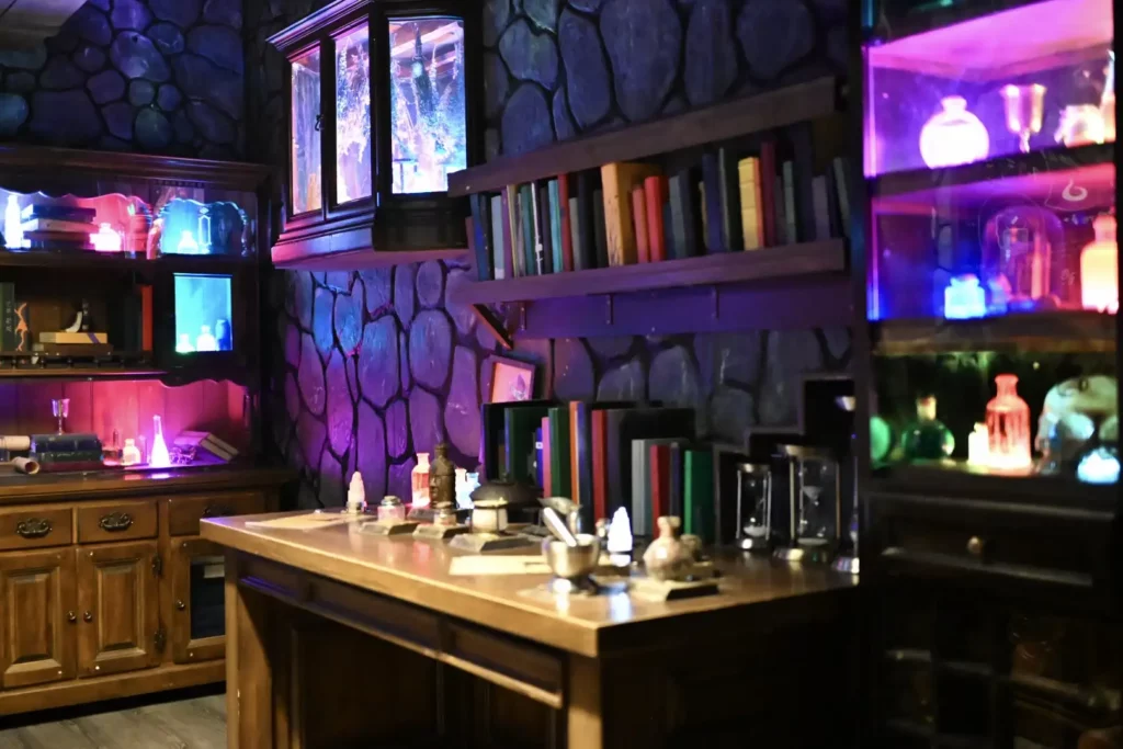 Desk with bookshelf and potion cases