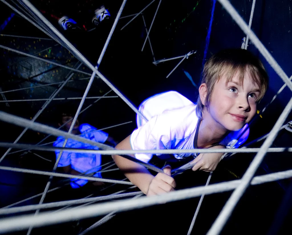 A child in spiderweb of bungeecoords